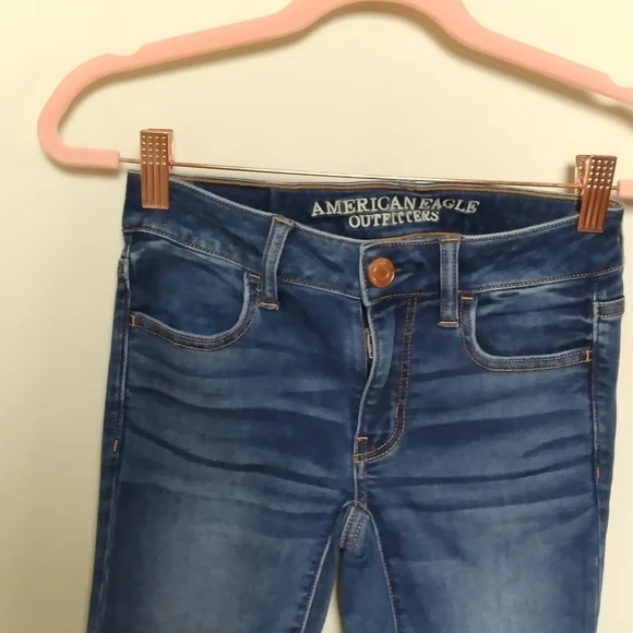 American Eagle Mid Rise Medium Wash Jeggings Size 00 Short - Picture 4 of 10